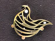 Tar brooch